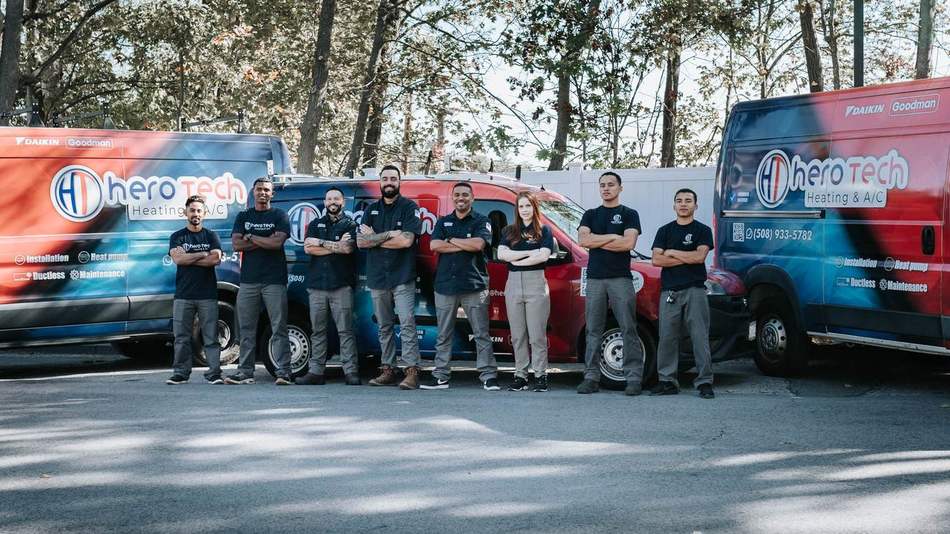The Hero Tech Heating & A/C team in a planning meeting at their Marlborough office